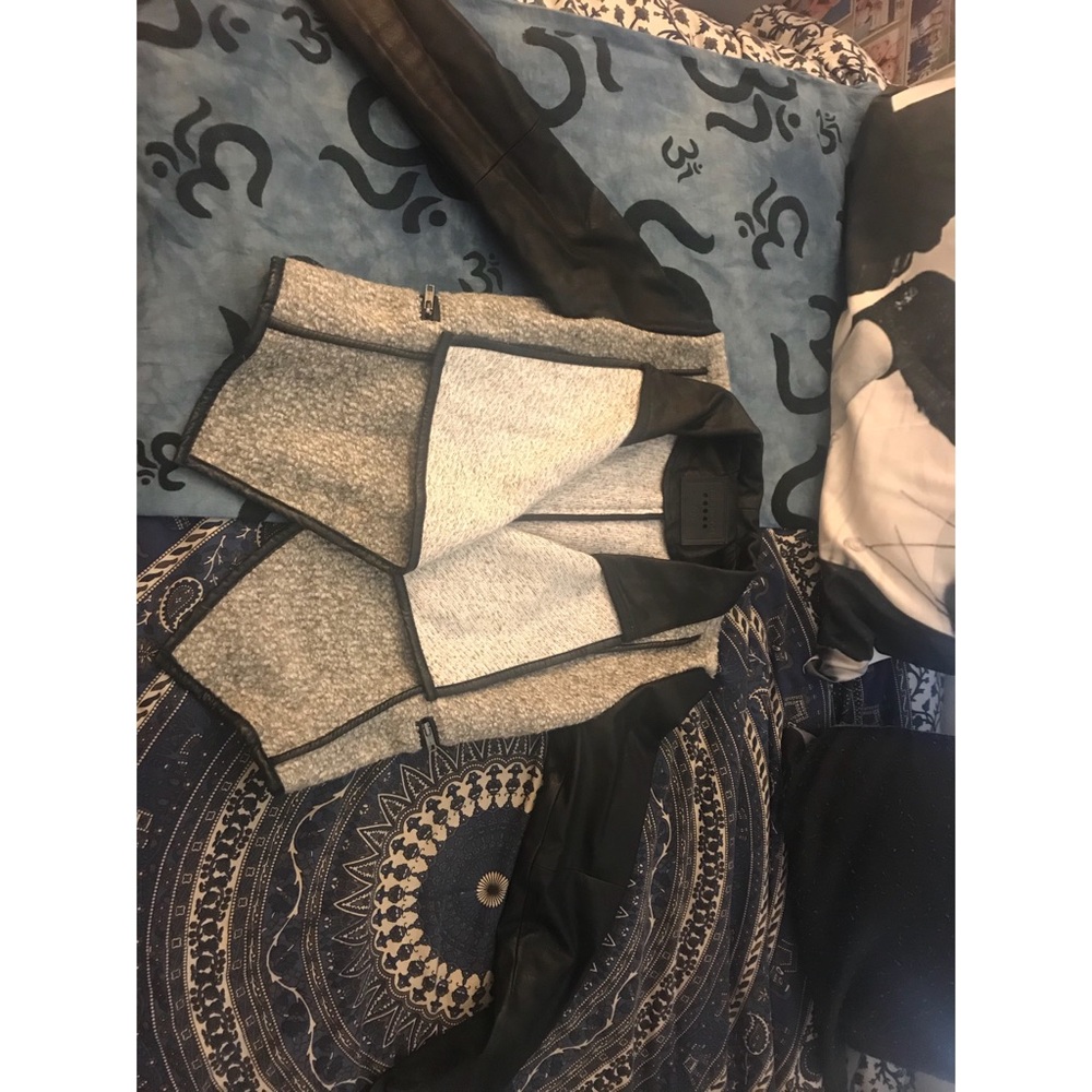 Grey and black leather jacket